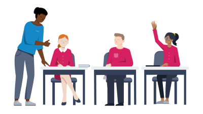 Teacher stood next to students' desks