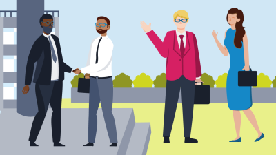 Four teachers greeting each other